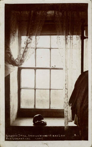 Dickie's Skull, in-situ at Tunstead Farm. A postcard from the 1800s